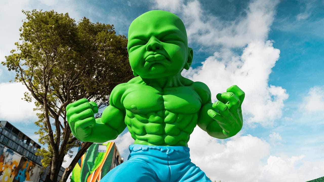 The green Temper Tot sculpture at Wynwood Walls